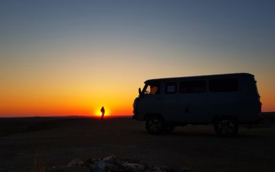 Van and person watching a sundowner.